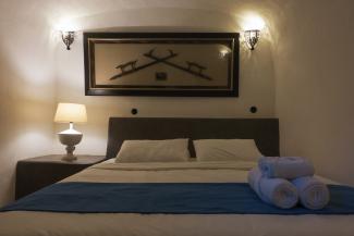 Double Room with Sharing Plunge Pool and Partial Caldera View